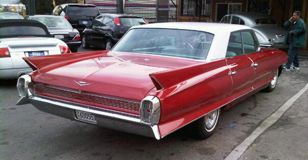 1962 Cadillac Sedan DeVille in Phonecian Red Dennis Buys Cars